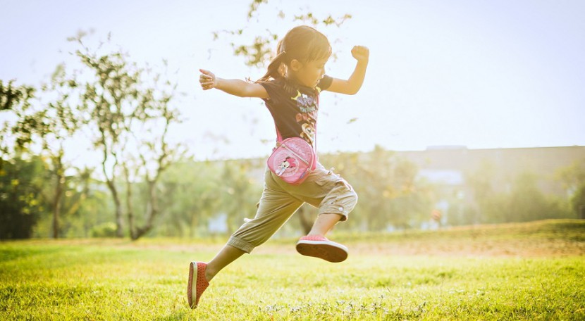 Girl running outdoors